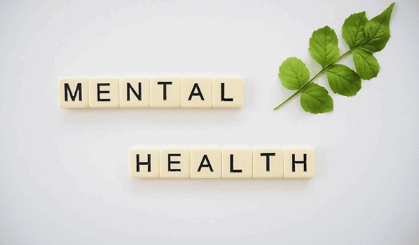 An image of tiles spelling out 'mental health'.
